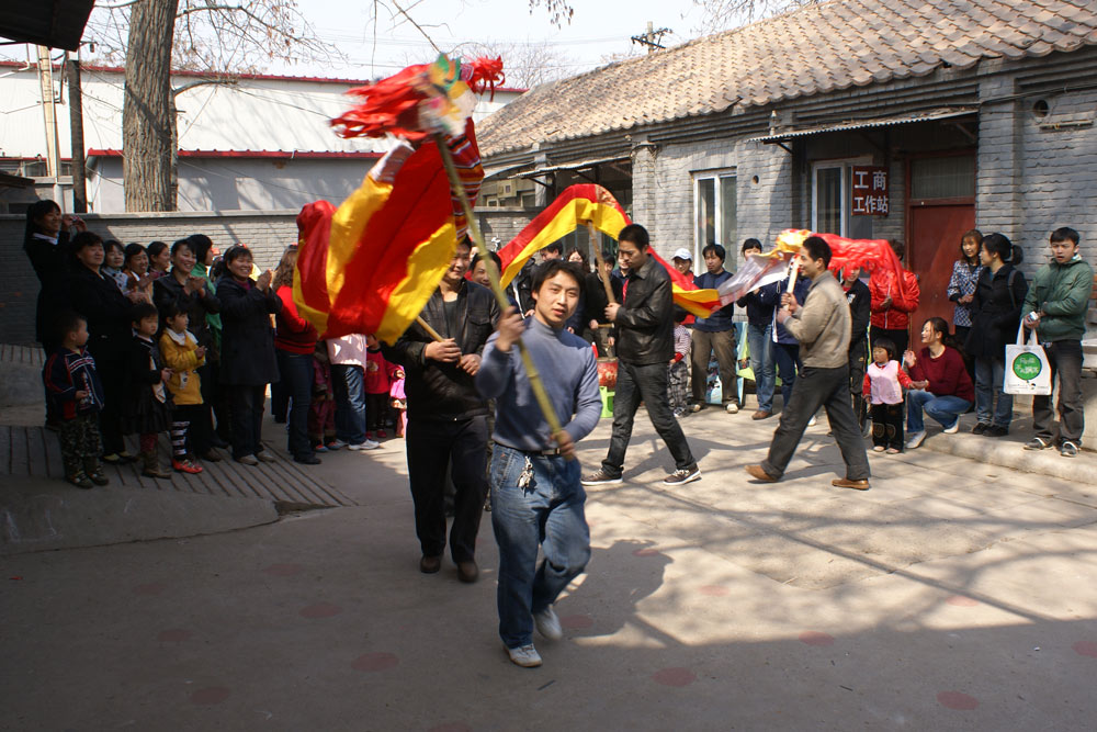 He Xiang leads a dragon dance in Beijing, 2010. Courtesy of the interviewees