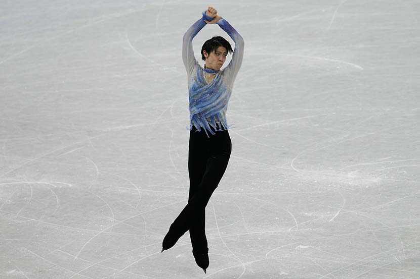 Yuzuru Hanyu competes during the men’s short program figure skating competition at the 2022 Winter Olympics in Beijing, Feb. 8, 2022. People Visual
