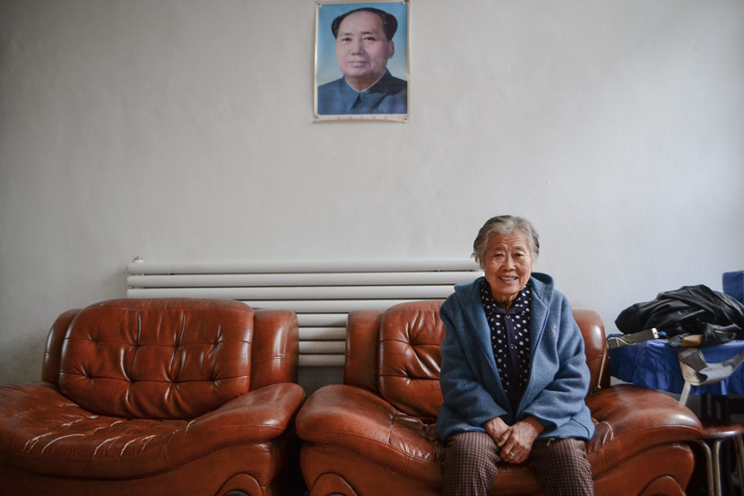 Zhang Peiying poses for a photo at her home in Beiwayao Village, Taiyuan, Shanxi province, Oct. 19, 2017. Fan Liya/Sixth Tone
