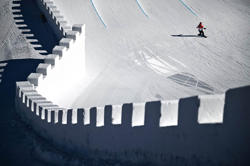 An athlete takes part in a snowboarding slopestyle practice session in Zhangjiakou on Feb. 2, 2022. Marco Bertorello/AFP via VCG