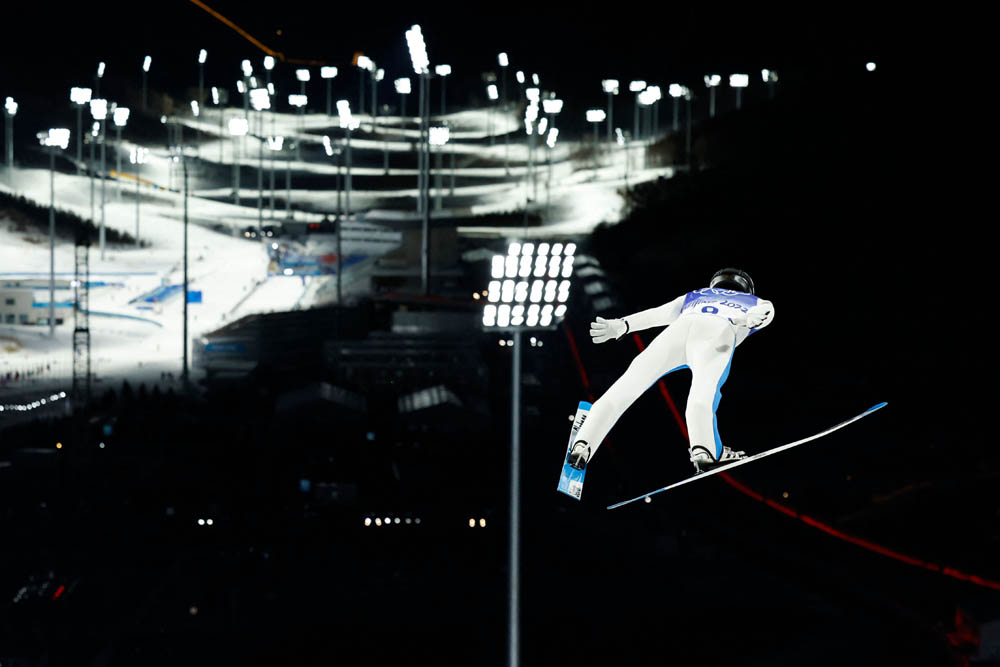 Slovenia’s Peter Prevc competes in the Ski Jumping Mixed Team Trial Round, in Zhangjiakou, Feb. 7, 2022. Odd Andersen/AFP via VCG