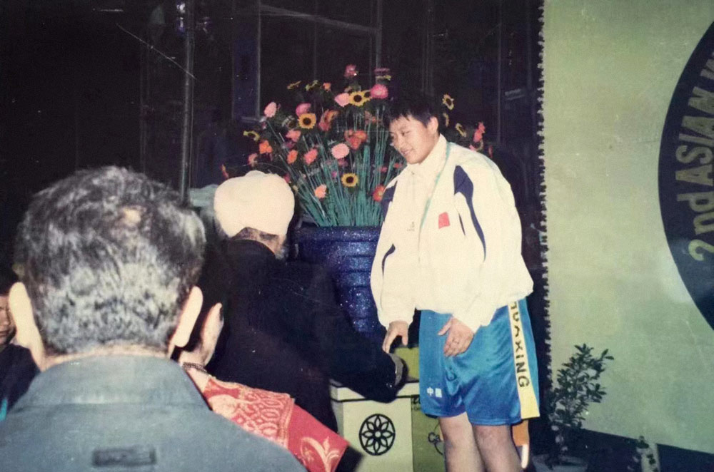 Wang Yanan wins the heavyweight title in Asian Women’s Amateur Boxing Championships in India, 2003. Courtesy Wang Yanan
