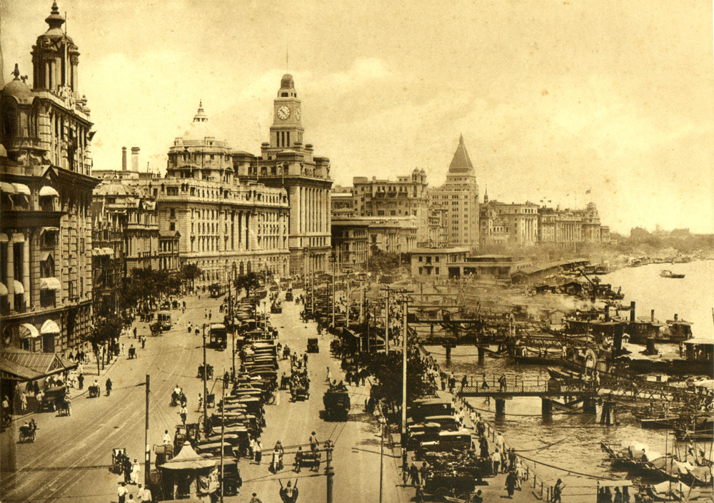 A view of The Bund in Shanghai, early 1930s. The tall building on the right side of the clock tower is the Cathay Hotel, where W. E. B. Du Bois stayed in 1936. Courtesy of Gao Yunxiang
