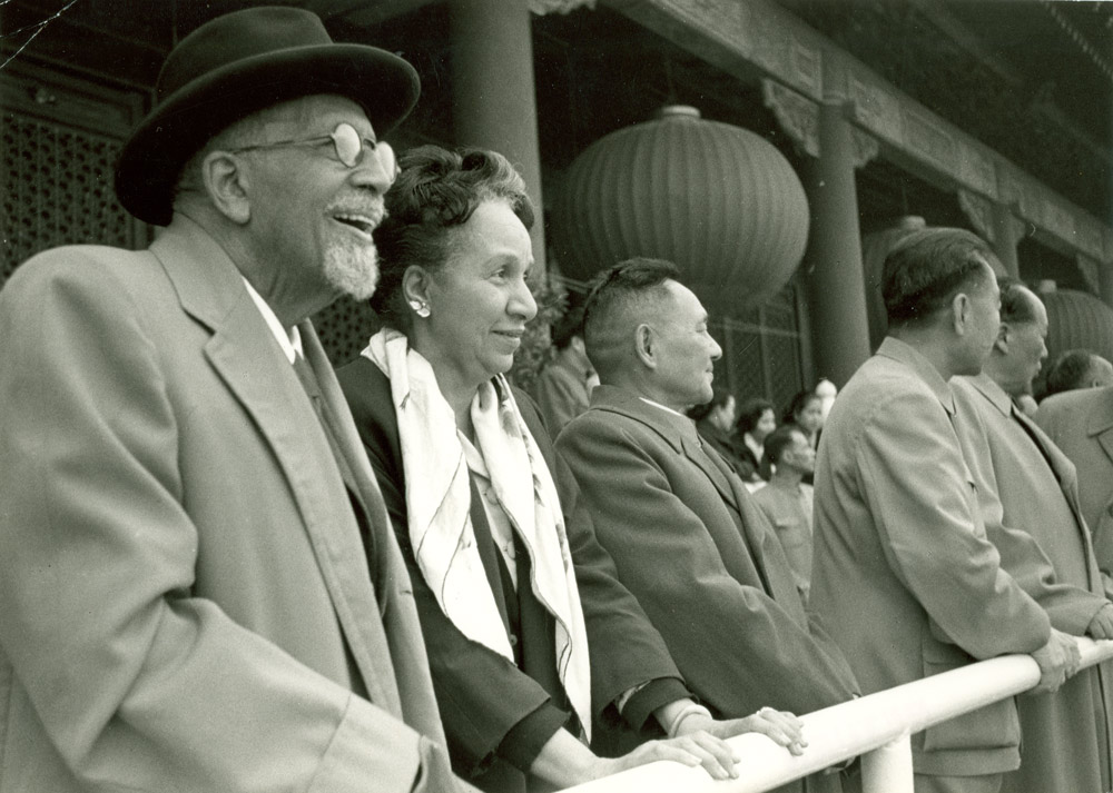 W. E. B. and Shirley Graham Du Bois watch a parade celebrating the 13th anniversary of the People’s Republic of China from a balcony overlooking Tian’anmen Square in Beijing, Oct. 1, 1962. To their right stand Deng Xiaoping, Zhou Enlai, and Mao Zedong. Courtesy of W. E. B. Du Bois Papers