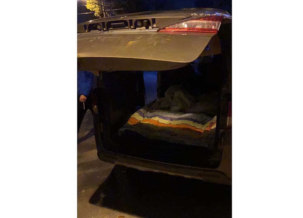 Geng and his colleagues’ bed in the van. Courtesy of Geng
