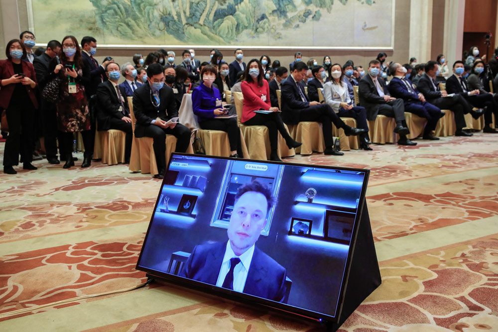 A video shows Elon Musk speaking during the China Development Forum 2021 at the Diaoyutai State Guesthouse in Beijing, March 20, 2021. Wu Hong/EPA via IC