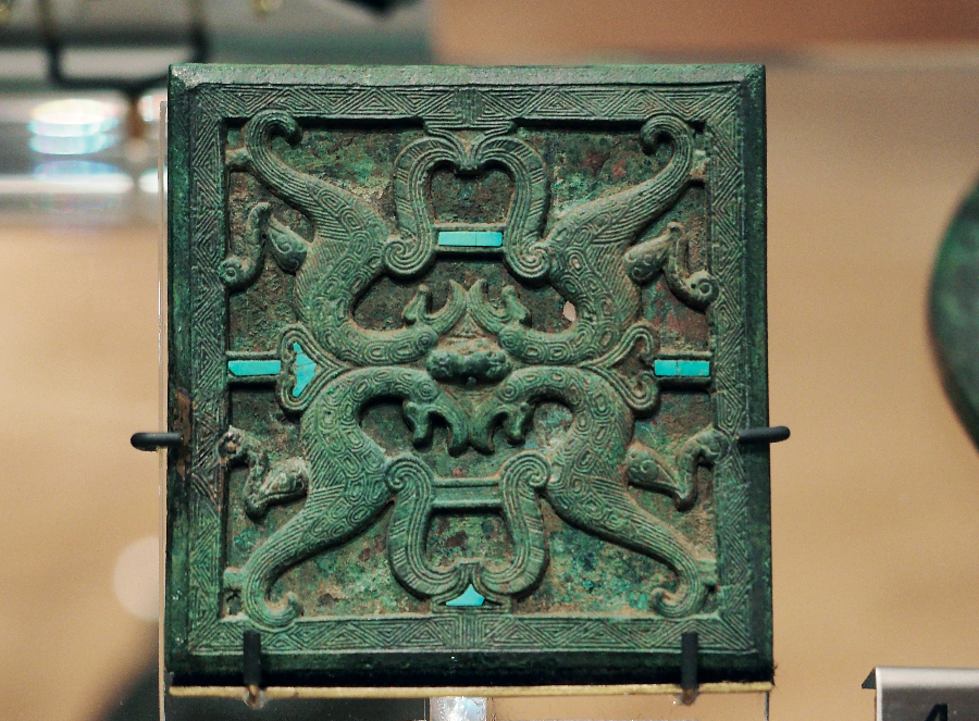 A square mirror inlaid with turquoise, likely from Jincun, held in collection by ROM. Photo provided by the interviewees