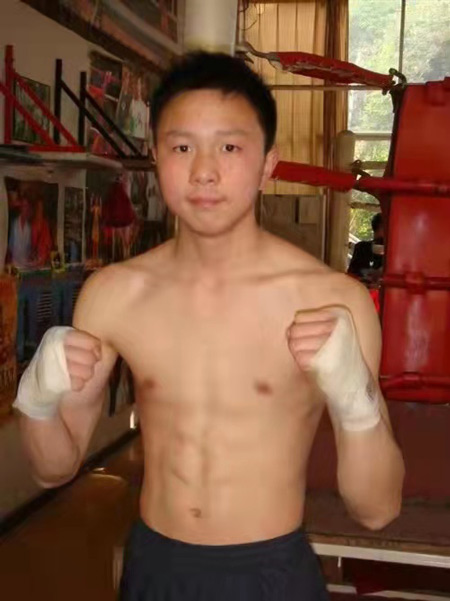 A teenaged Xu Can works out at Liu Gang's Zhong Wei Gym in Kunming, Yunnan province. Courtesy of Liu Gang