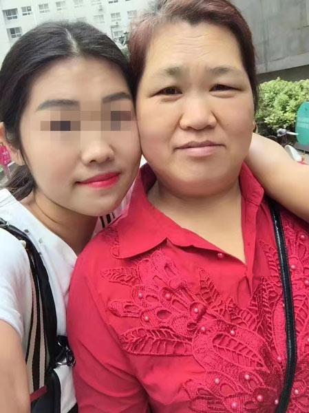A photo of Wei Qiaolan and her daughter. Courtesy of the interviewee