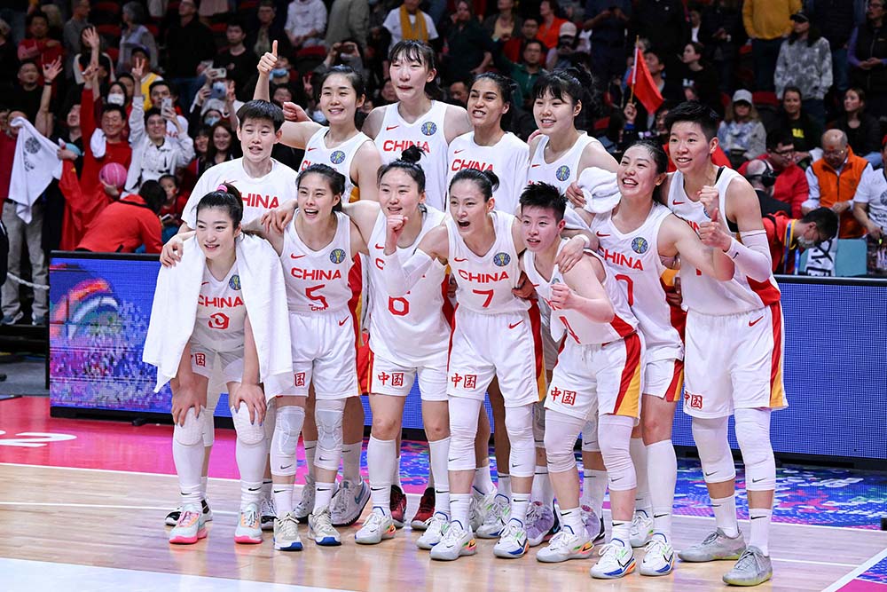China’s players celebrate after winning the 2022 Women’s Basketball World Cup quarter-final match between China and France at Sydney Superdome, in Sydney, Australia, Sept. 29, 2022. WILLIAM WEST/VCG