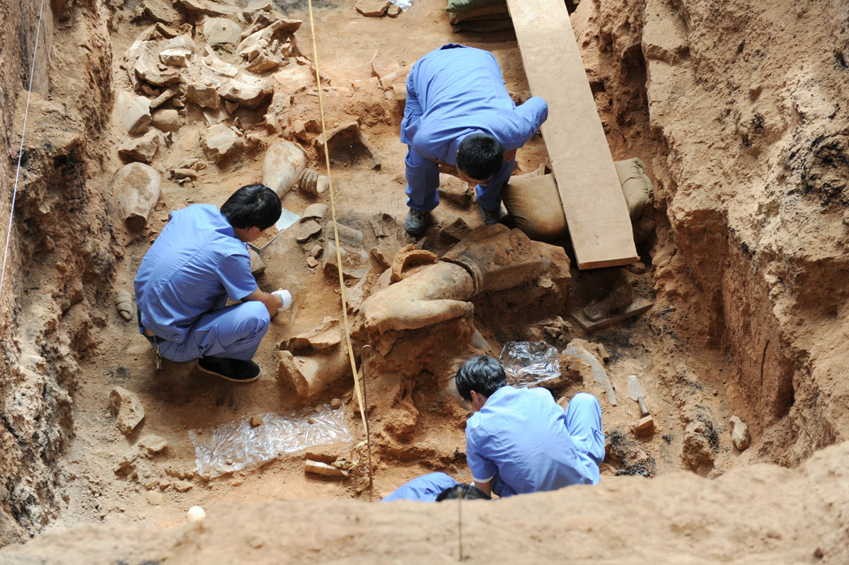 Archaeologists work inside one of the pits at the Qin Shihuang Mausoleum in Xi’an, Shaanxi province, 2012. Zhang Yuan/CNS/VCG