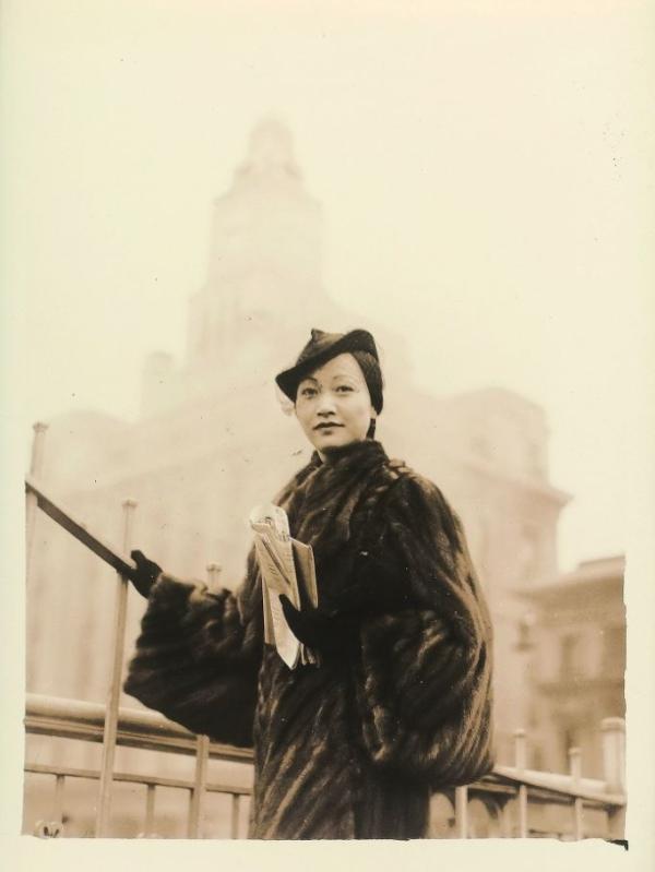 Anna May Wong stands by the Huangpu River, in Shanghai, 1936. From The Paper