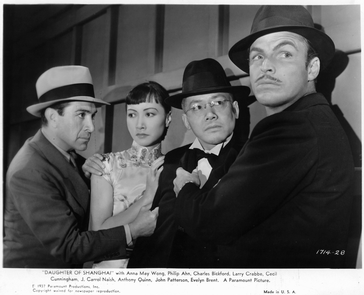 Anna May Wong and Philip Ahn are grabbed by J. Carrol Naish and Buster Crabbe in a scene from the film “Daughter of Shanghai,” 1937. Paramount via VCG