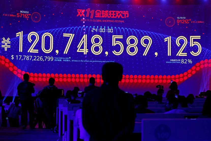 A screen displaying the total value of goods sold during Alibaba Group’s 11.11 Singles’ Day global shopping festival in Shenzhen, Guangdong province, Nov. 12, 2016. Bobby Yip/VCG