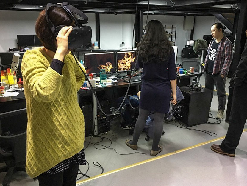 Zhao Qi’s team test out virtual reality effects at their studio in Beijing, 2017. Courtesy of Zhao Qi