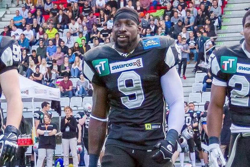 Wendell Brown walks onto the football field while playing for the Swarco Raiders of Innsbruck, Austria. Courtesy of Emma Liu
