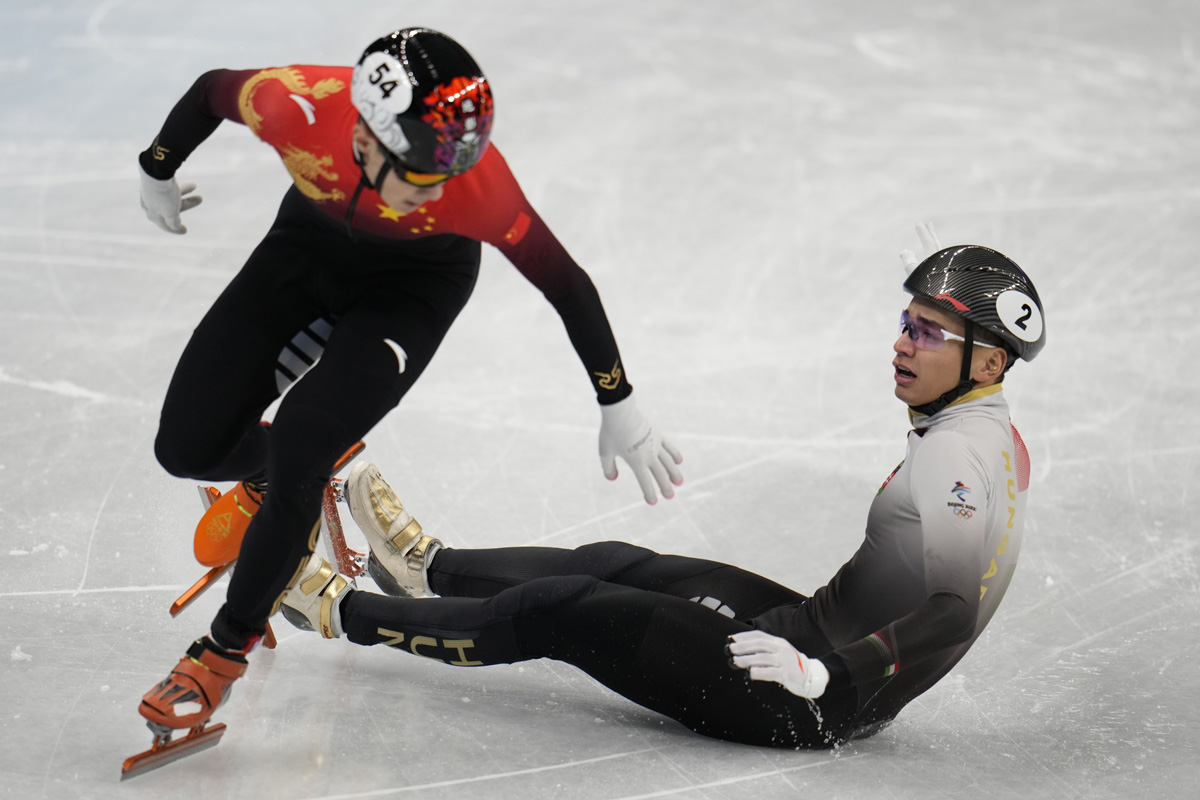 Liu Shaolin Sandor (right) and Ren Ziwei compete during the Men’s 1,000m Final during the 2022 Beijing Winter Olympics at the Capital Indoor Stadium, Feb. 7, 2022. Fred Lee/VCG