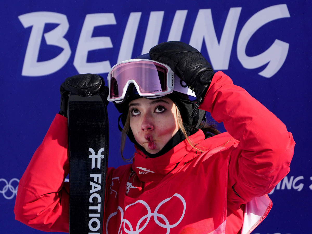 Eileen Gu makes a face while waiting to see her score in the women’s freeski slopestyle final run, Zhangjiakou, Hebei province, Feb. 15, 2022. She won a silver medal at the event. Rex/IC