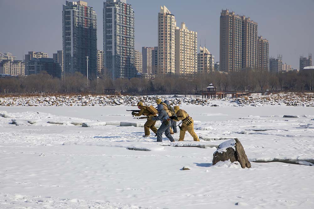Actors are filmed during a scene in Jilin, Jilin province, Feb. 20, 2022. VCG