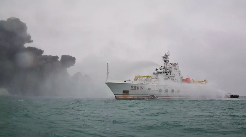 A rescue ship uses water cannons to extinguish the fire on the oil tanker Sanchi in open waters off the coast of China, Jan. 7, 2018. From the Chinese Ministry of Transport’s WeChat account