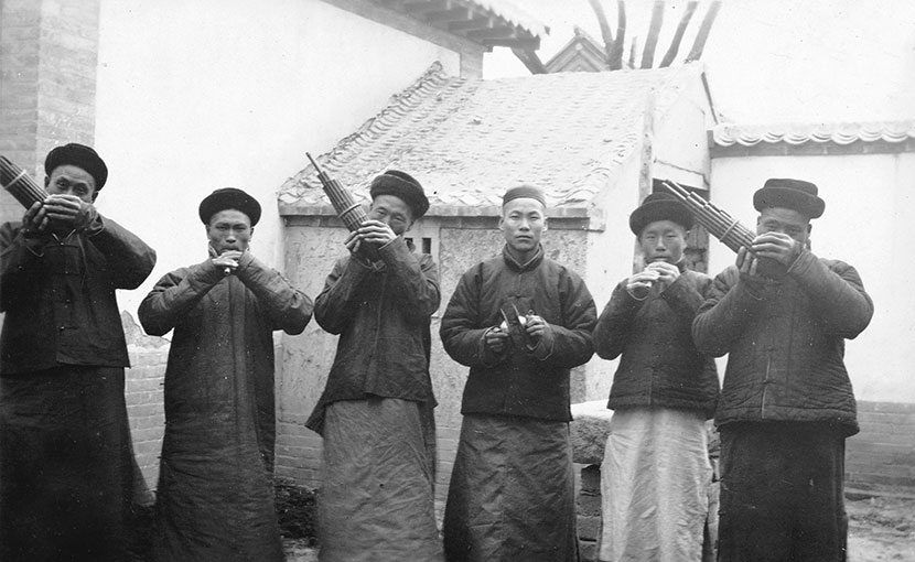 A folk band plays at an event in Yantai, Shandong province, in the early 1900s. Courtesy of ‘Old Photos’