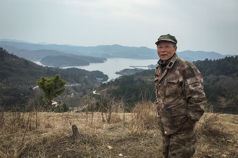 Shen Exiang poses for a photo on the Hanzi Mountain on the outskirts of Wuhan, Hubei province, Feb. 7, 2018. Fan Yiying/Sixth Tone