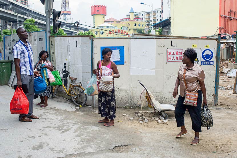 An African family near a wholesale market in Guangzhou, Guangdong province, July 15, 2014. Dave Tacon/Polaris/VCG