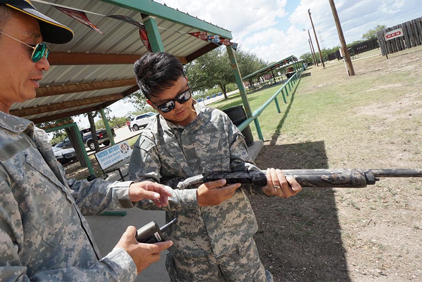 A Joy One World client learns how to use a rifle in Texas, U.S., July 20, 2017. Courtesy of Joy One World