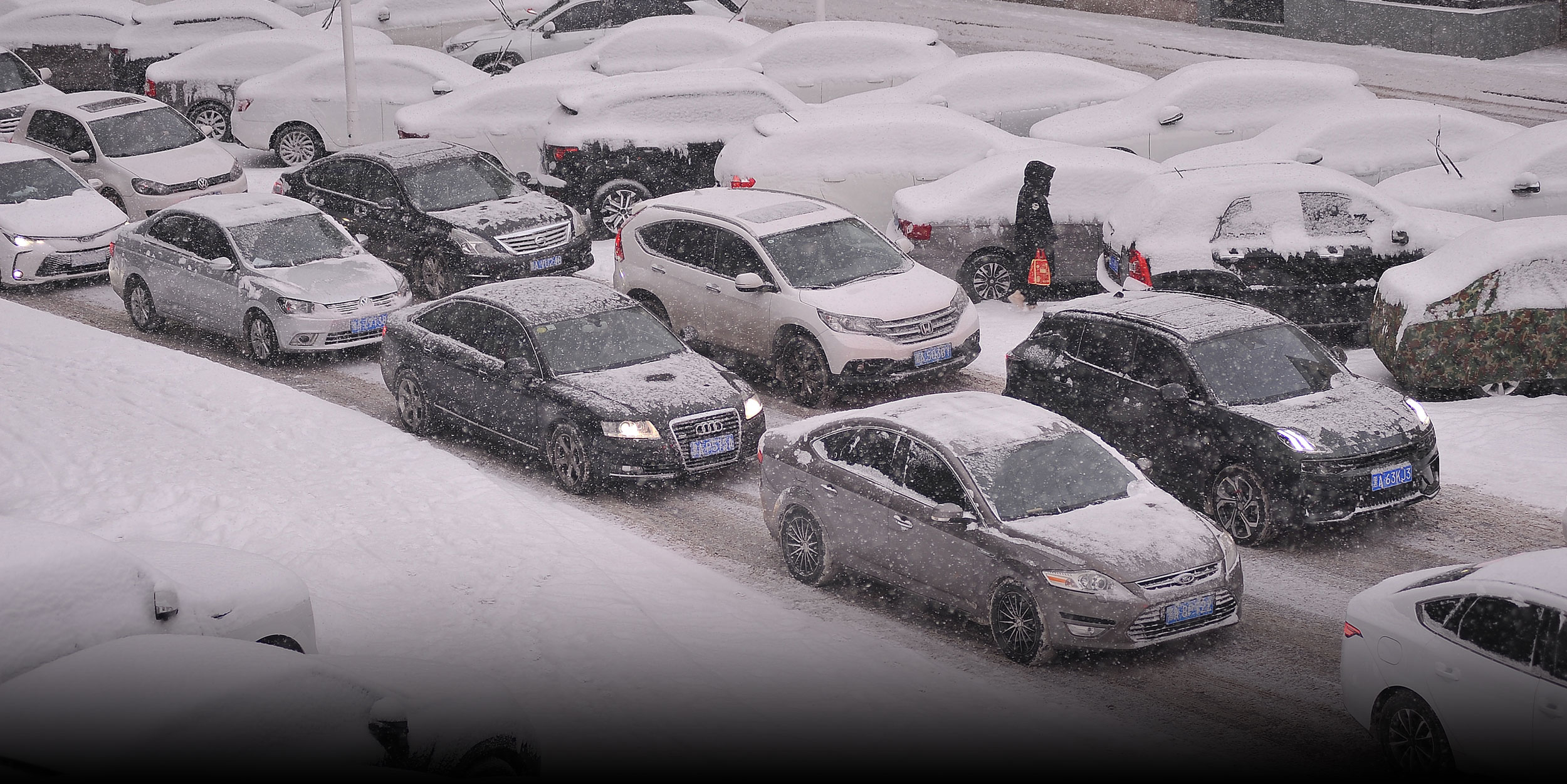 Historic Blizzard Blocks Roads, Buries Cars in Northeast China thumbnail